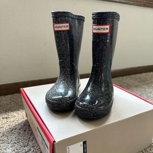 Brand new Hunter toddler rain boots. Sparkly black color.